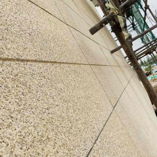 庆阳 黄金麻花岗岩荔枝面外墙干挂石材效果示例