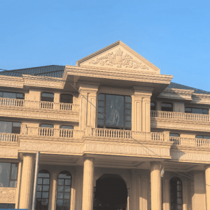 庆阳黄金麻别墅外墙干挂石材效果示例