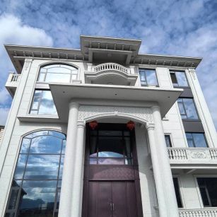 庆阳白麻别墅外墙干挂石材效果示例