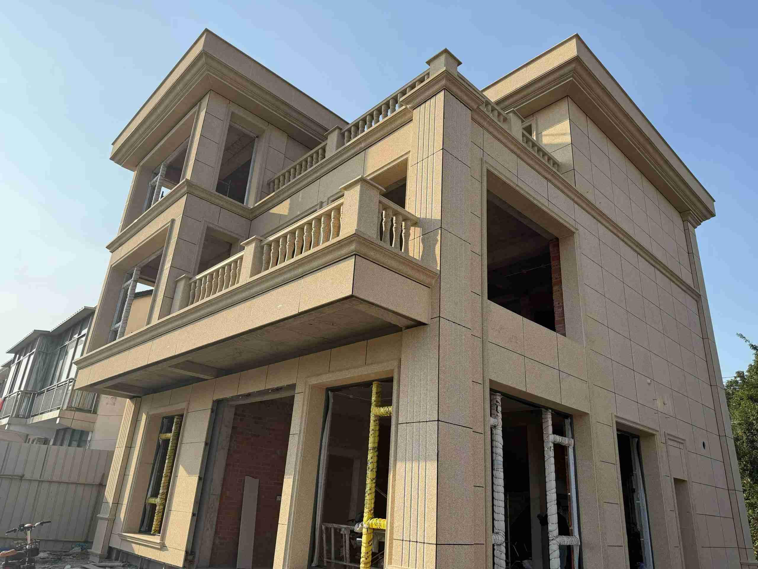 庆阳 黄金麻花岗岩石材荔枝面外墙干挂效果展示