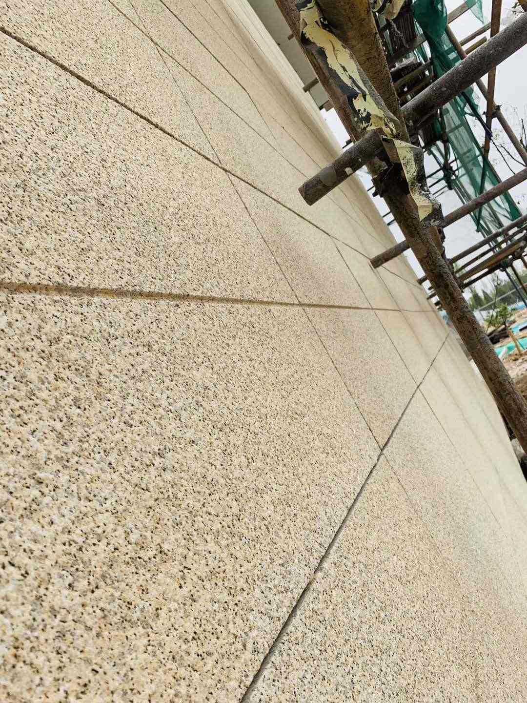 庆阳 黄金麻花岗岩荔枝面外墙干挂石材效果示例