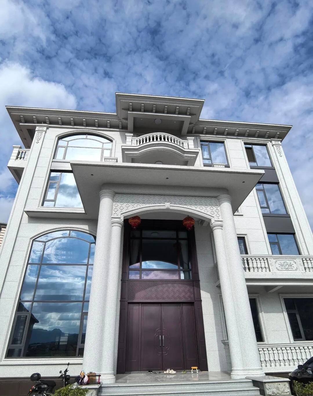 庆阳白麻别墅外墙干挂石材效果示例